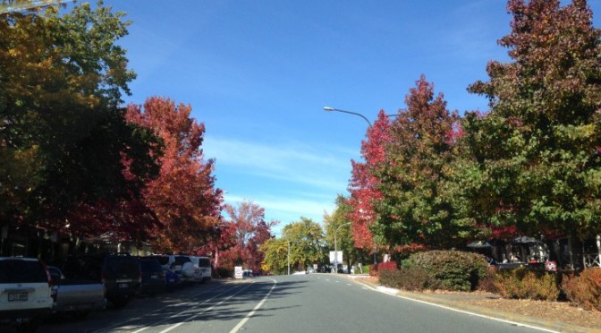 Hot cocoa, boots, jeans and pink cheeks